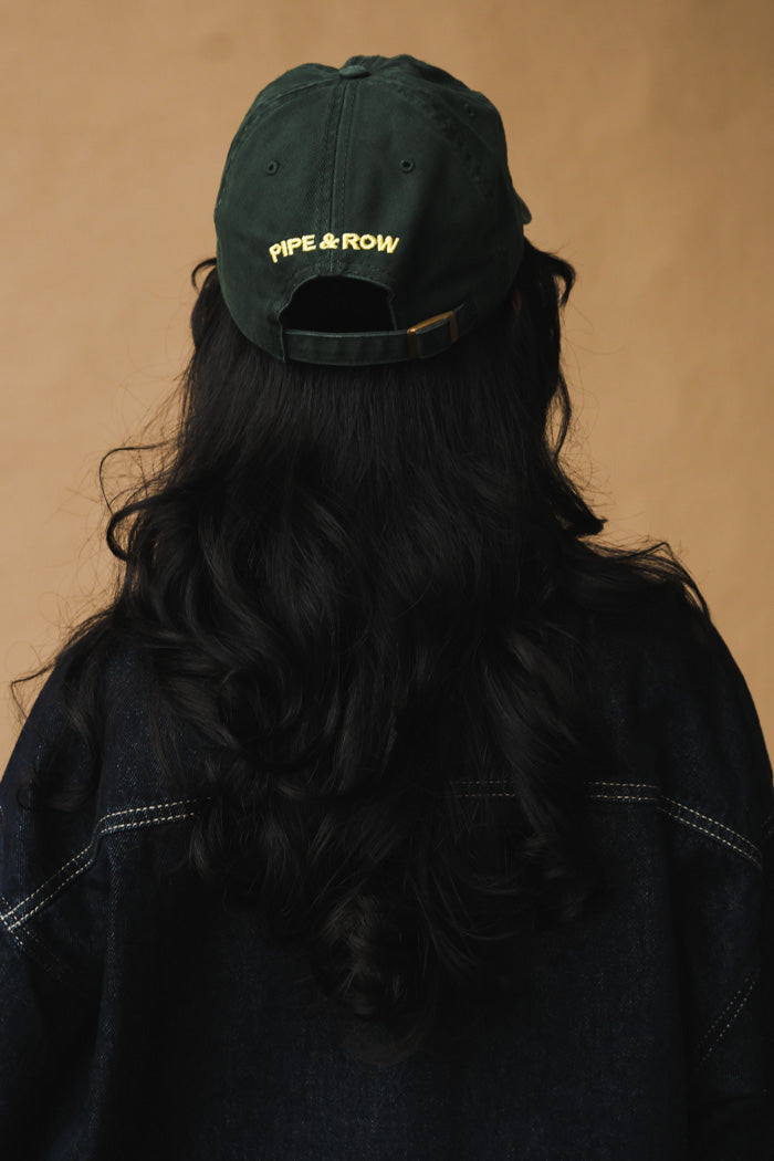 Pipe and Row dark green hat embroidered yellow flower "P&R" back | PIPE AND ROW