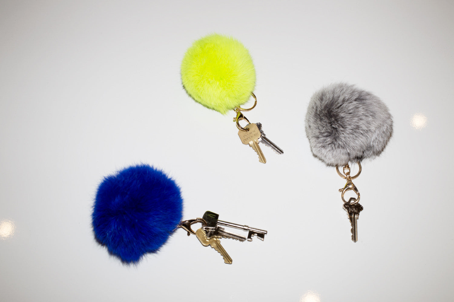 KEYCHAINS + PINS