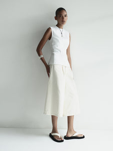 Agolde 80's gaucho relaxed fit long shorts in solar cream. PIPE AND ROW