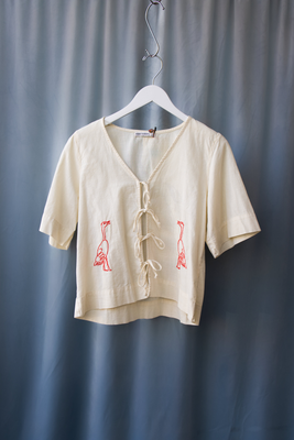 Bobo Choses embroidery tied blouse in off white with duck print. B126AD026 PIPE AND ROW