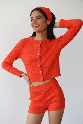 Callahan fitted cable knit Valerie cardigan sweater poppy orange red | Pipe and Row