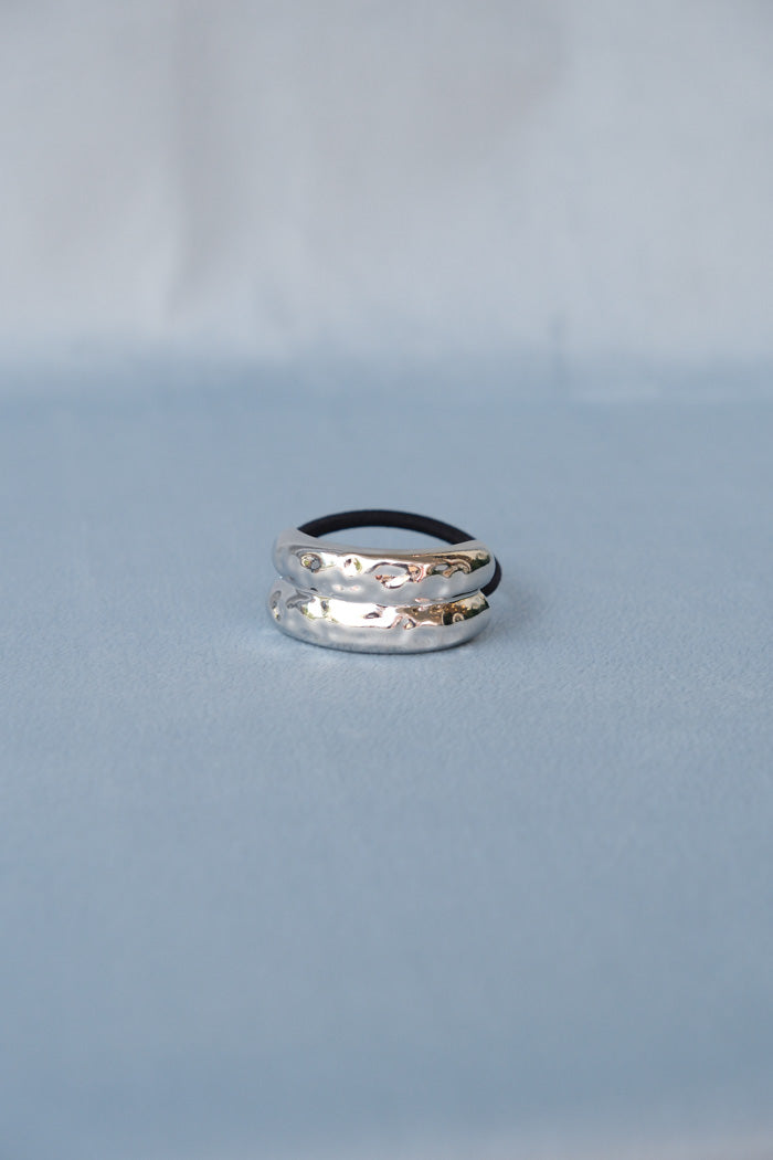 Double arched silver pebbled metal hair tie PIPE AND ROW
