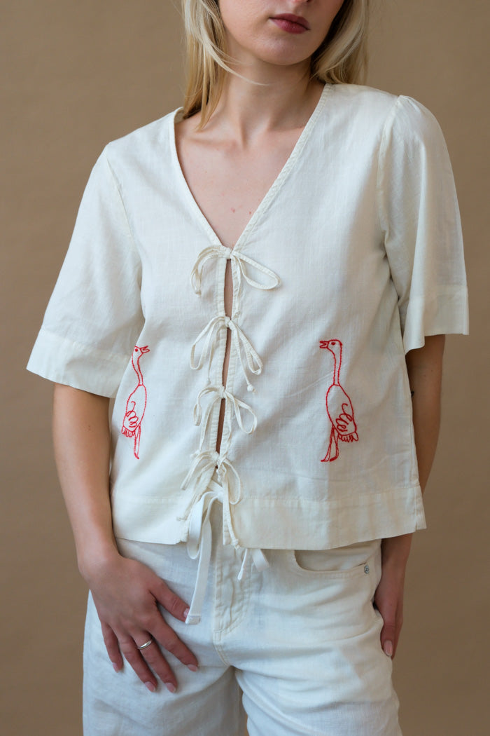 EMBROIDERY TIED BLOUSE
