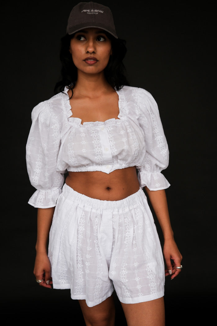 Toit Volant white eyelet cotton ruffle button up cropped top | Pipe and Row