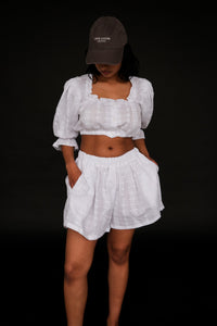 Toit Volant white eyelet cotton ruffle button up cropped top | Pipe and Row