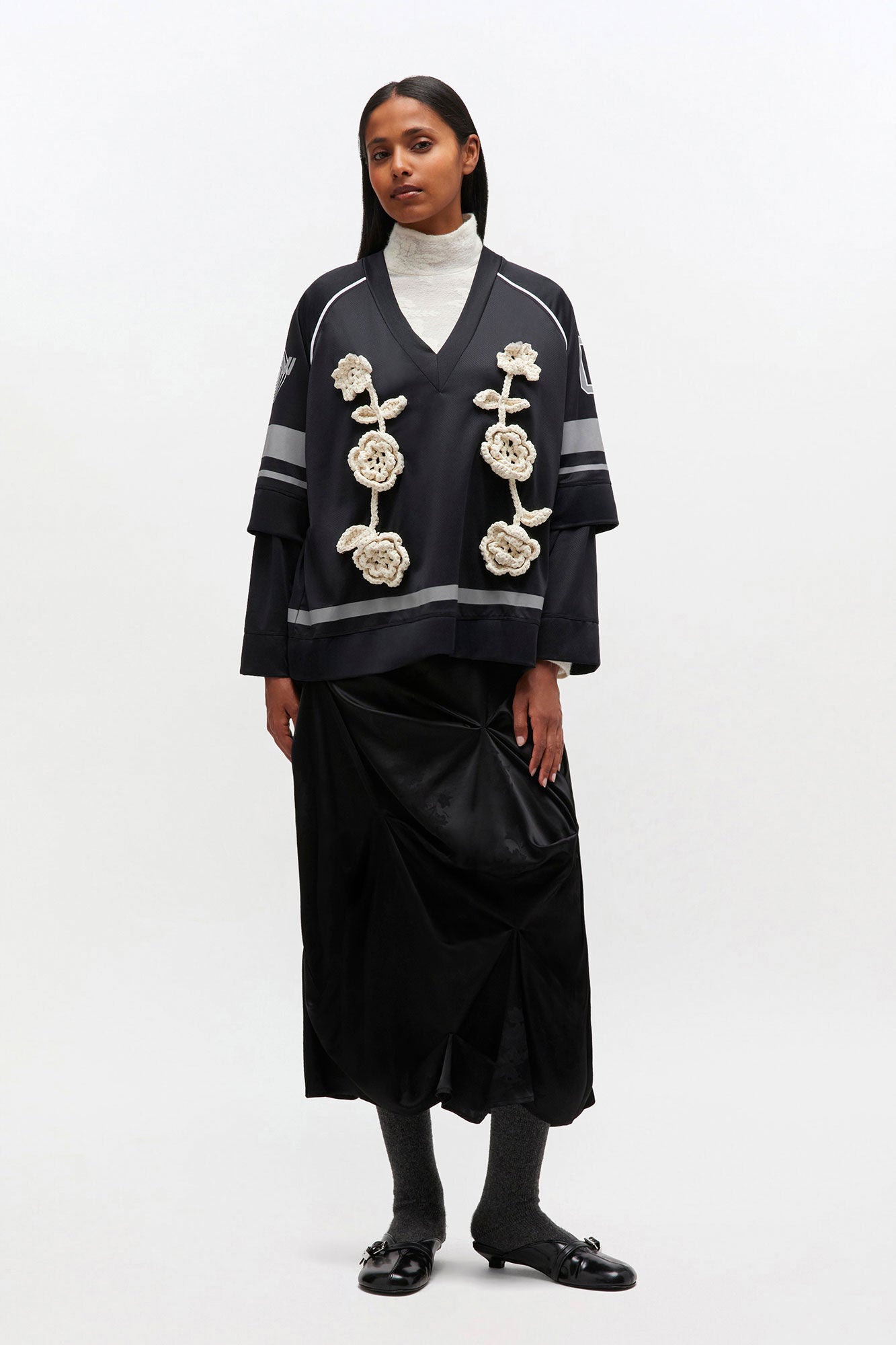 Ganni black v-neck long sleeve jersey crochet flower | Pipe and Row