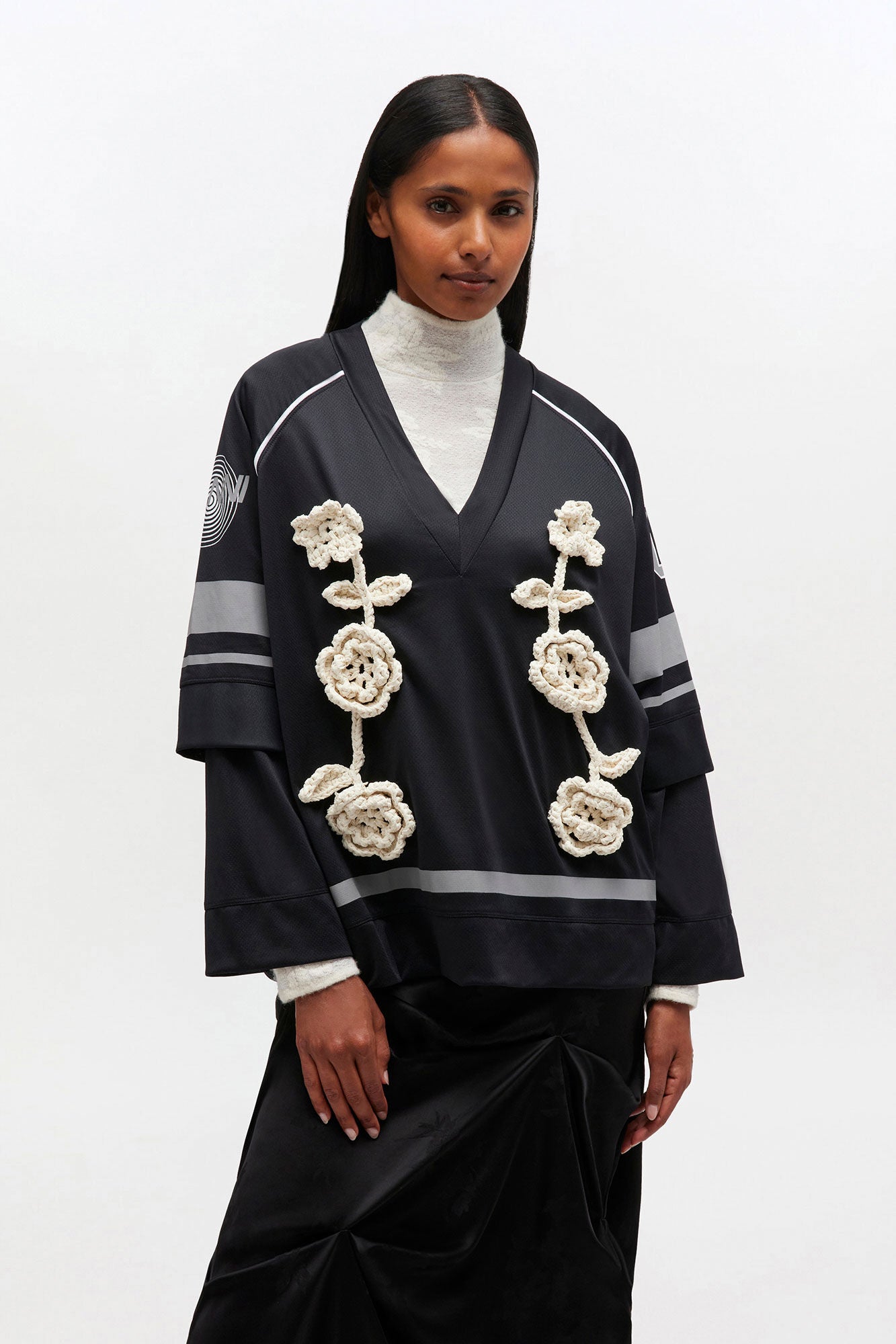 Ganni black v-neck long sleeve jersey crochet flower | Pipe and Row