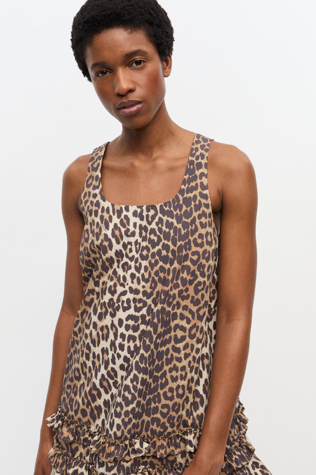 Ganni printed cotton poplin U-neck mini dress cheetah leopard print ruffled hem | Pipe and Row - PIPE AND ROW Ganni printed cotton poplin U-neck mini dress cheetah leopard print ruffled hem | Pipe and Row - PIPE AND ROW