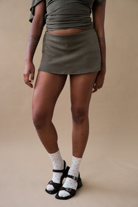 Geel Aria micro mini skirt featuring built-in shorts olive green | Pipe and Row Seattle
