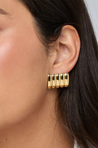 Heaven Mayhem oversized ribbed curved Clemmie Maxi stud earrings gold | Pipe and Row