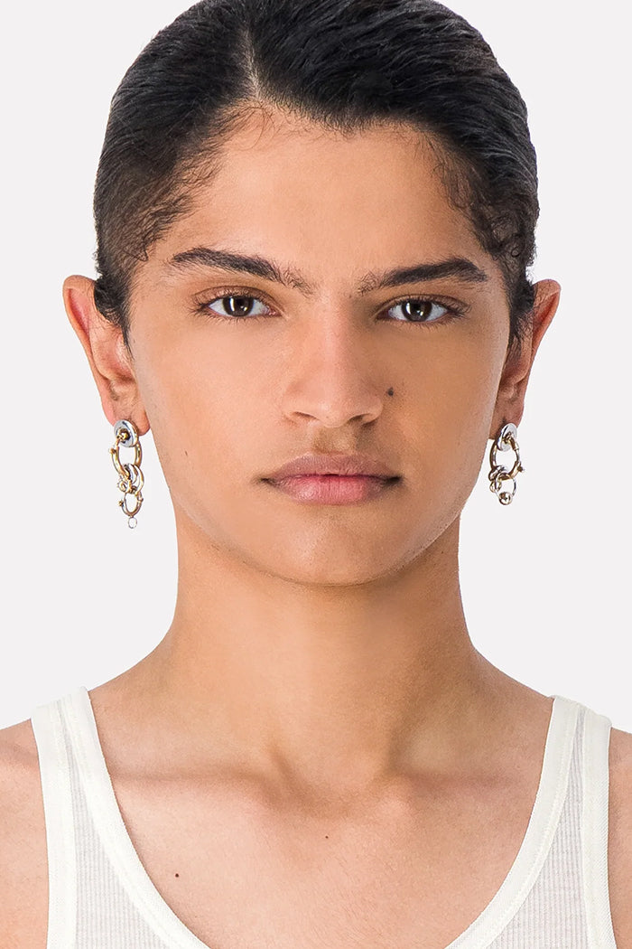Justine Clenquet Pam mismatched earrings mixed gold silver palladium | Pipe and Row