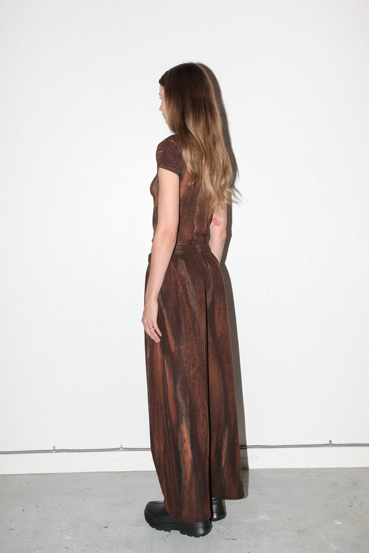 KkCo baby tee t-shirt mineral dye mud brown eyelet barbell piercing silver | Pipe and Row Seattle