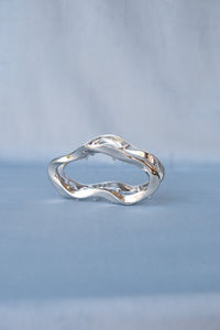 Large metal open oval hair claw in silver. PIPE AND ROW