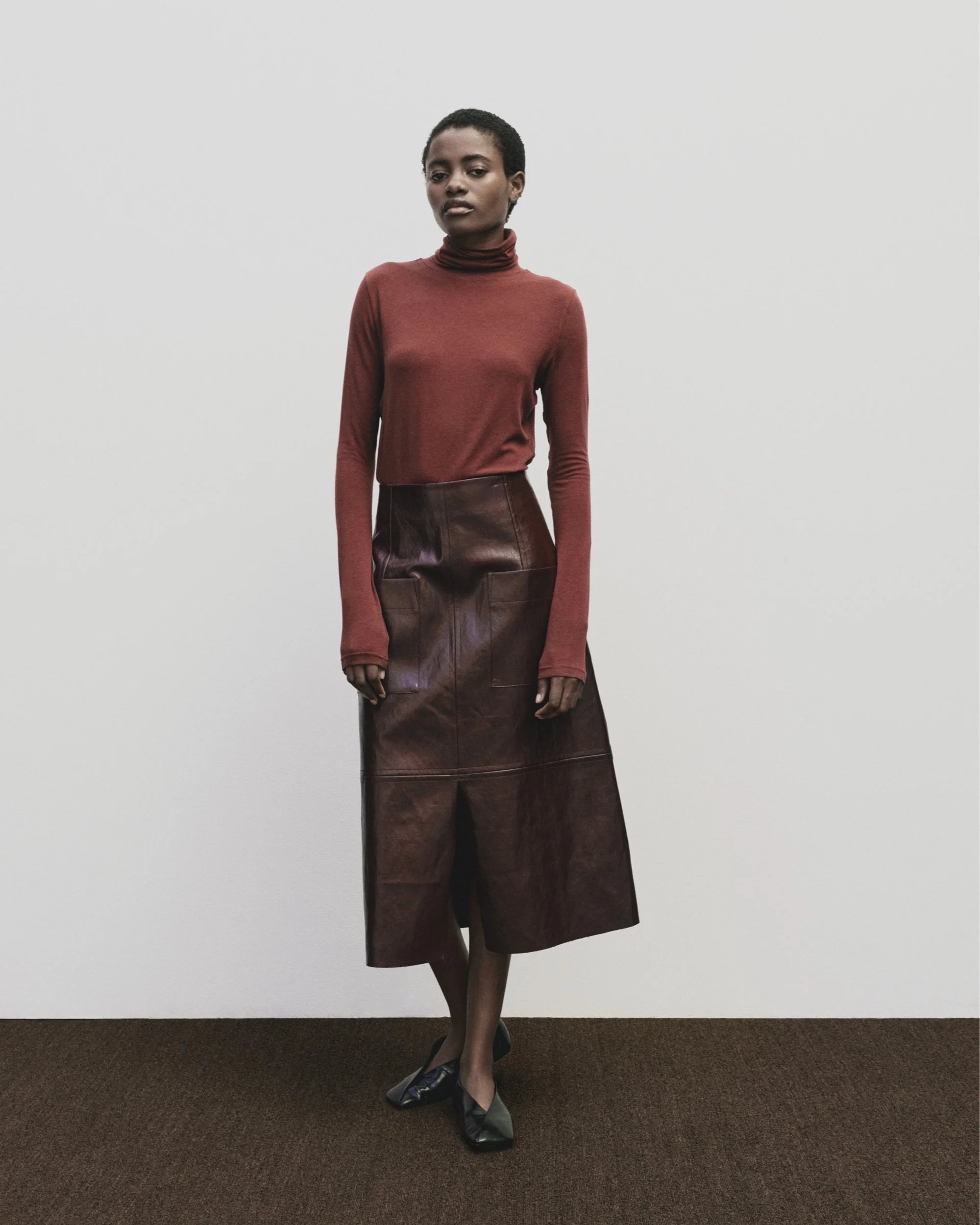 Mijeong Park roll neck jersey top in burgundy red |  PIPE AND ROW
