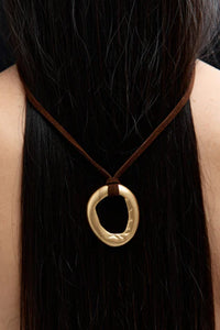 Heaven Mayhem mini necklace gold circular pendant rich brown cord | Pipe and Row