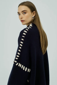 Norr navy blue Strings oversized knit sweater contrast stitch | Pipe and Row