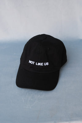 "Not like us" embroidered black dad hat PIPE AND ROW