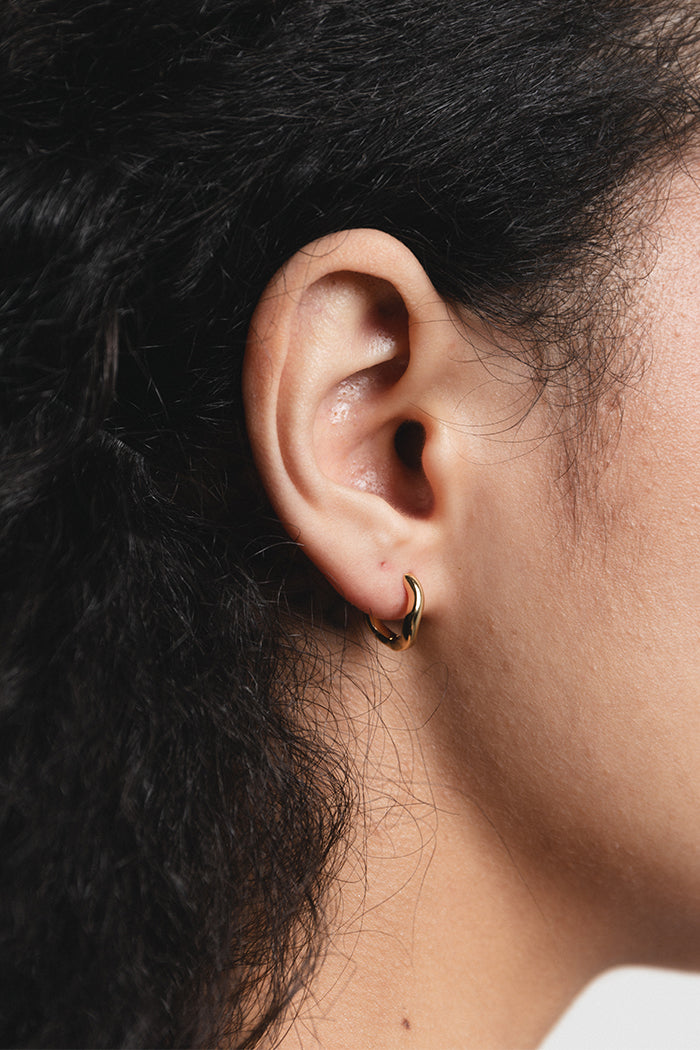 Wolf Circus small Rowan organic wavy huggie hoops gold | Pipe and Row