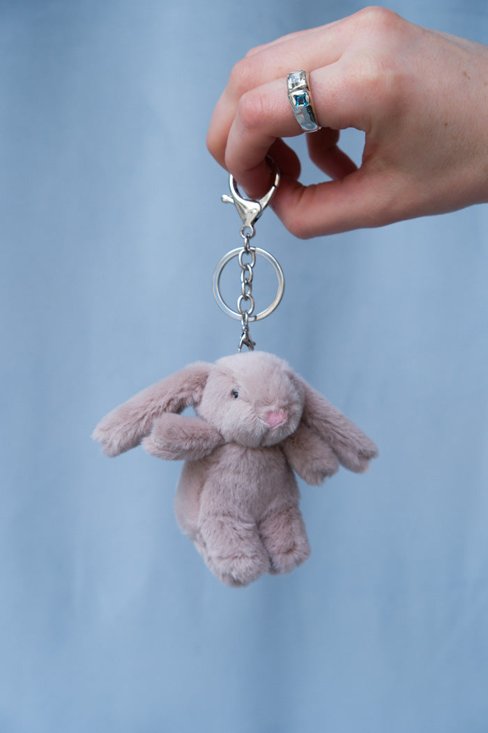 Tan plush fuzzy bunny bag charm. PIPE AND ROW