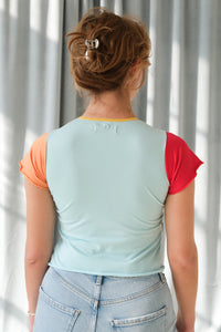 Tyler Mcgillivary Lovebird print Tee baby tee bright orange color blocked sleeves | PIPE AND ROW