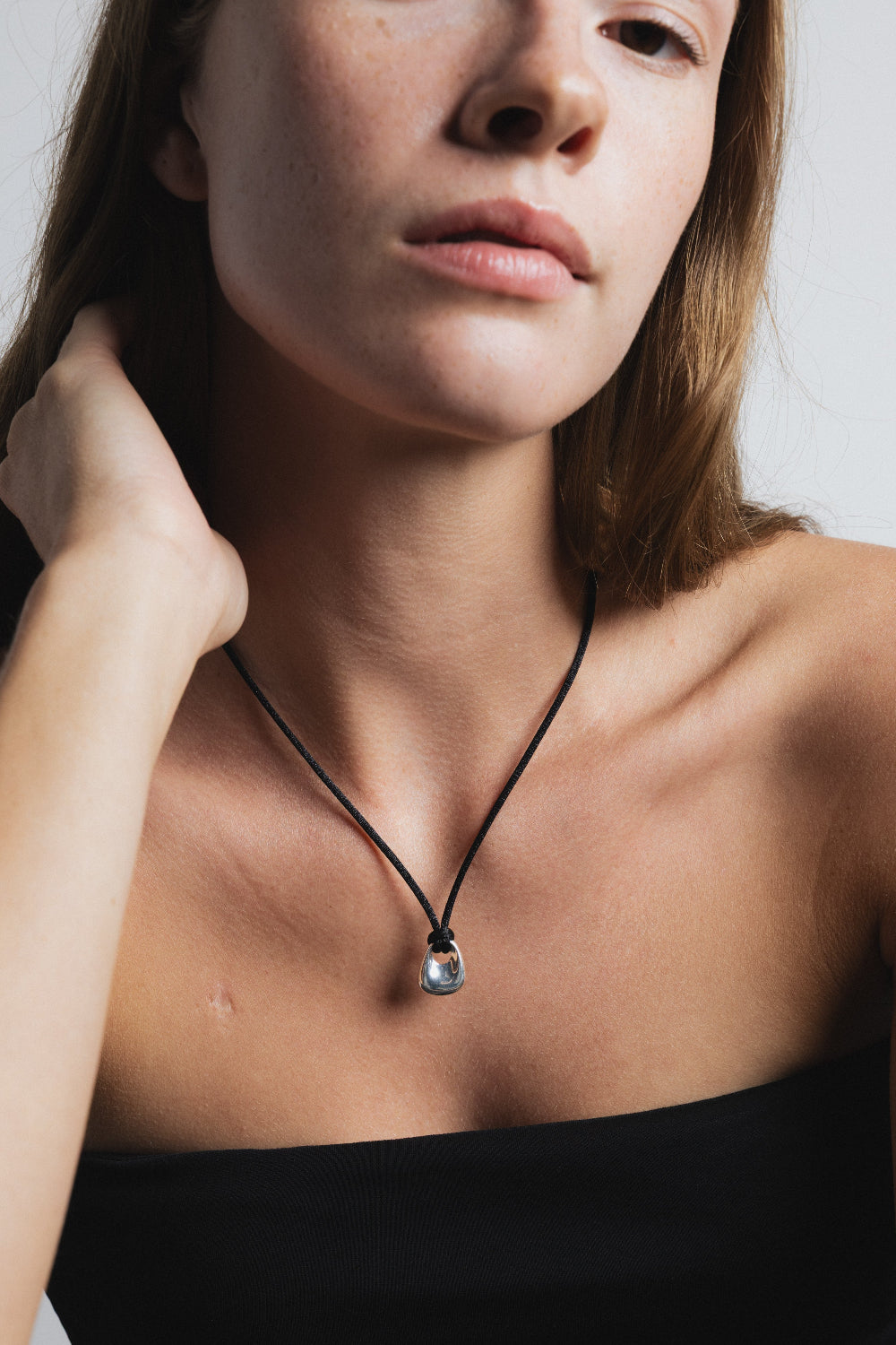 Wolf Circus black satin cord necklace statement pendant | Pipe and Row