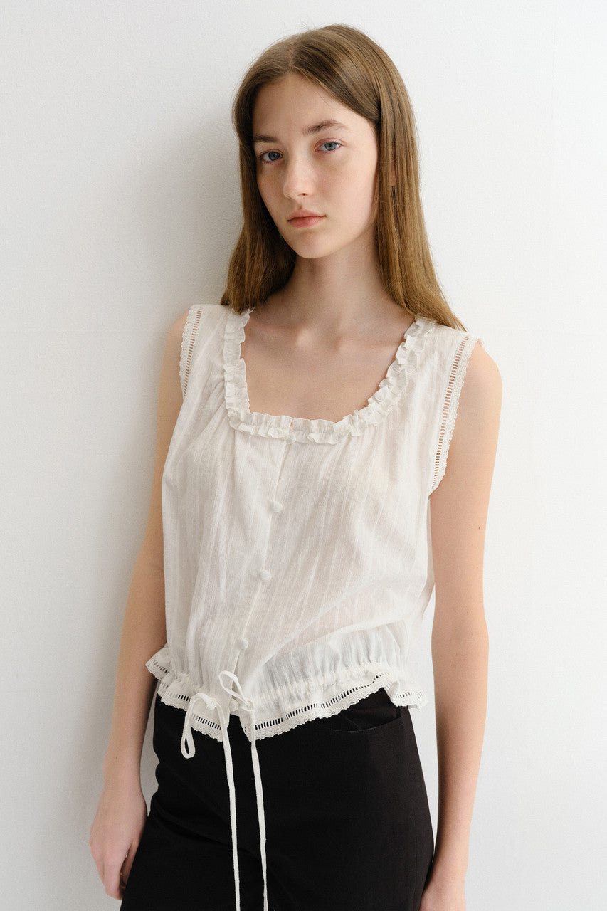 FRILLED SLEEVELESS BLOUSE