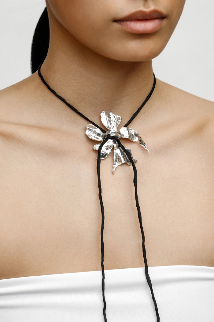 Wolf Circus silver metal Flower necklace black silk cord | Pipe and Row