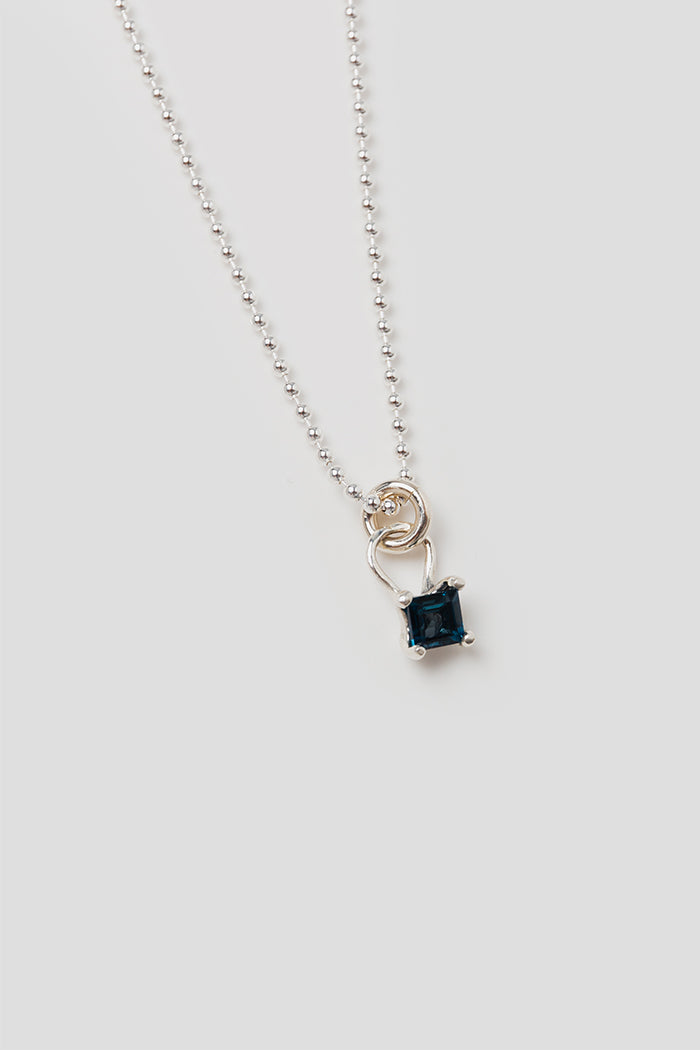 Wolf Circus Mira blue topaz pendant necklace 18" bead chain | Pipe and Row