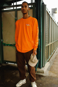 Keep it Movin' sports club long sleeve tee bright orange | pipe and row seattle