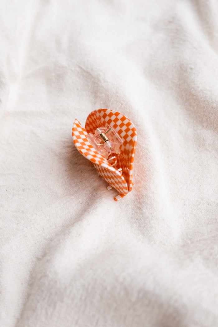 ASYMMETRICAL HAIR CLAW ORANGE CHECK