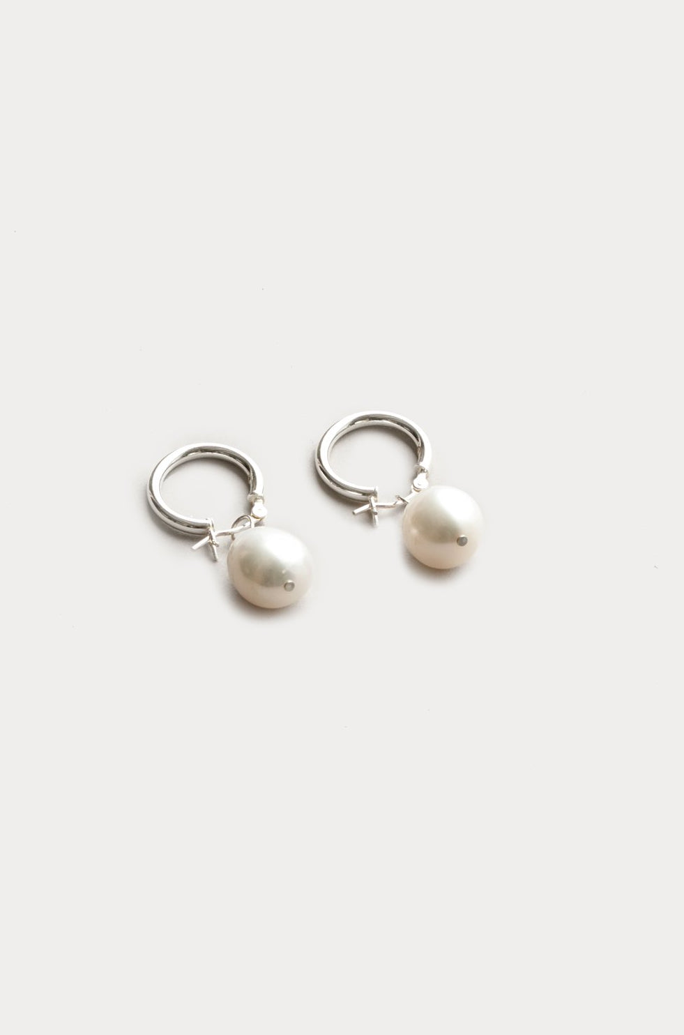 Wolf Circus fresh water Pearl small Hoops minimal, modern, recycled metal sustainable ethically made | pipe and row 