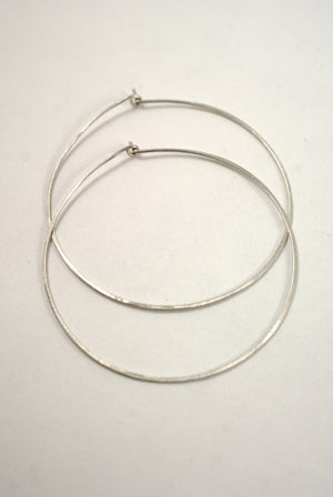 Minimalist hoops lightly hammered earrings sterling silver | Pipe and Row