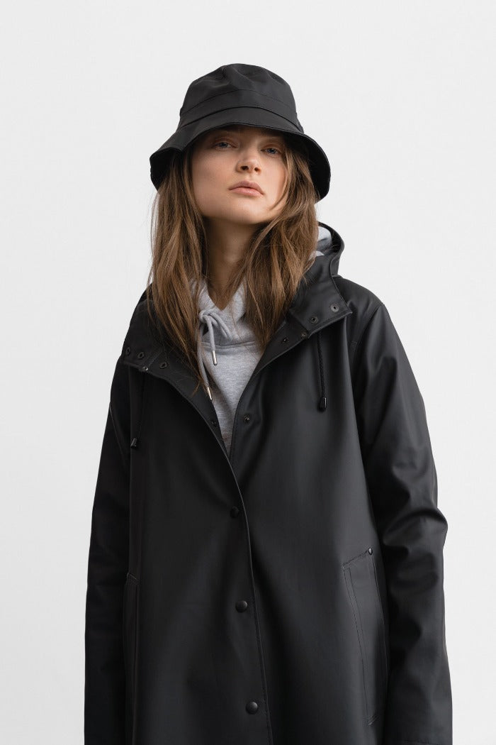 Stutterheim Mosebacke long raincoat black flowing A-line women | PIPE AND ROW boutique