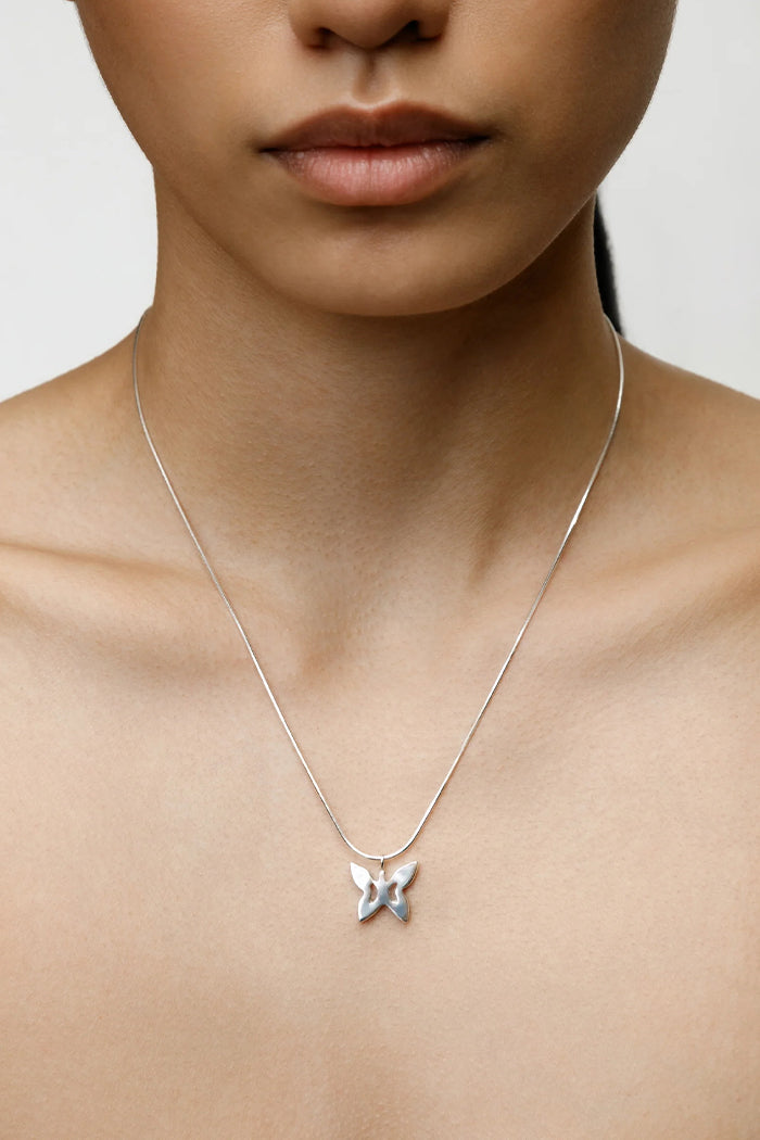Wolf Circus butterfly charm necklace silver | Pipe and Row boutique Seattle