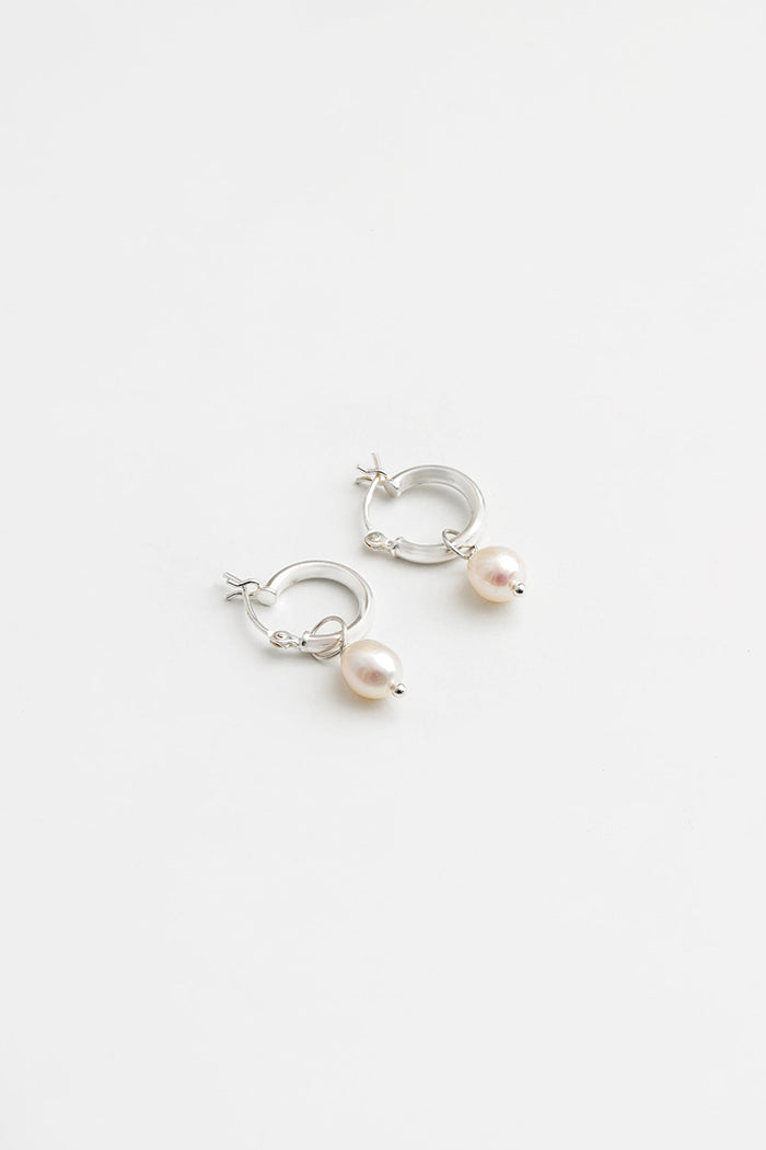 Wolf Circus silver freshwater dainty small Pearl Hoops | Pipe and Row Seattle