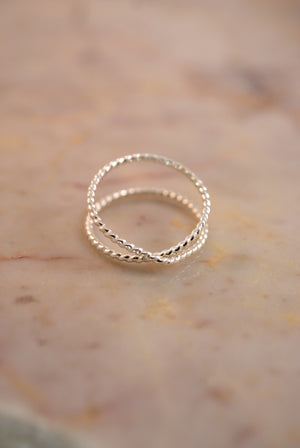 best selling statement stacking ring dainty minimal modern Twisted X ring sterling silver handmade | Pipe and Row