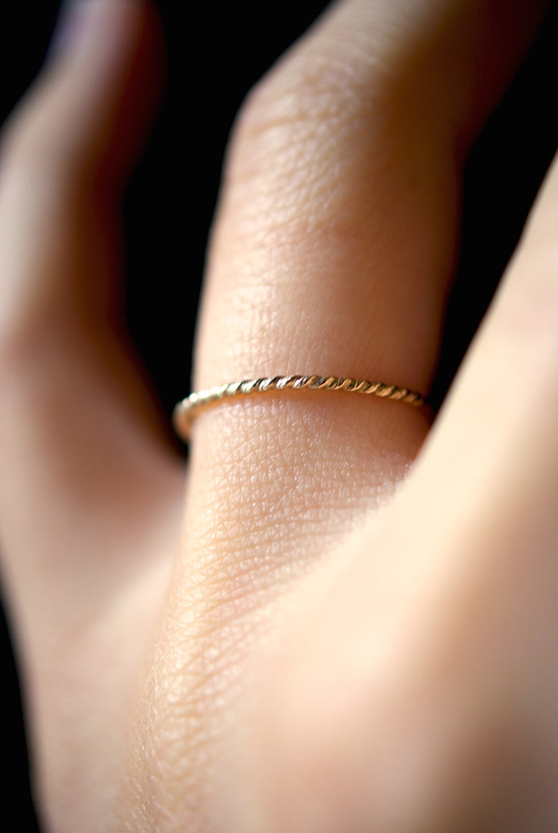 TWISTED THIN STACKING RING