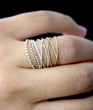 Textured twisted wraparound stacking rings 14k gold jewelry | PIPE AND ROW